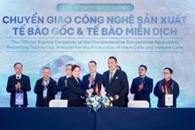 The signing ceremony between the two units.