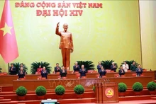 The Presidium presides over the 14th National Congress of the Communist Party of Viet Nam (Photo: VNA)