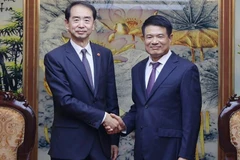 Supreme People’s Procuratorate Chief Prosecutor Nguyen Huy Tien and He Wei, Ambassador Extraordinary and Plenipotentiary of the People’s Republic of China to Viet Nam.