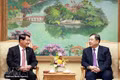 Standing Deputy Prime Minister Pham Gia Tuc (R) receives Athsaphangthong Siphandone, member of the Lao People’s Revolutionary Party Central Committee, Secretary of the Vientiane Party Committee and Chairman of the municipal People’s Council, on May 12, 2026. (Photo: VNA)