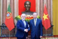 Party General Secretary and State President To Lam (R) receives Portuguese Ambassador Joaquim Alberto De Sousa Moreira De Lemos in Ha Noi on July 6. (Photo: nhandan.vn)