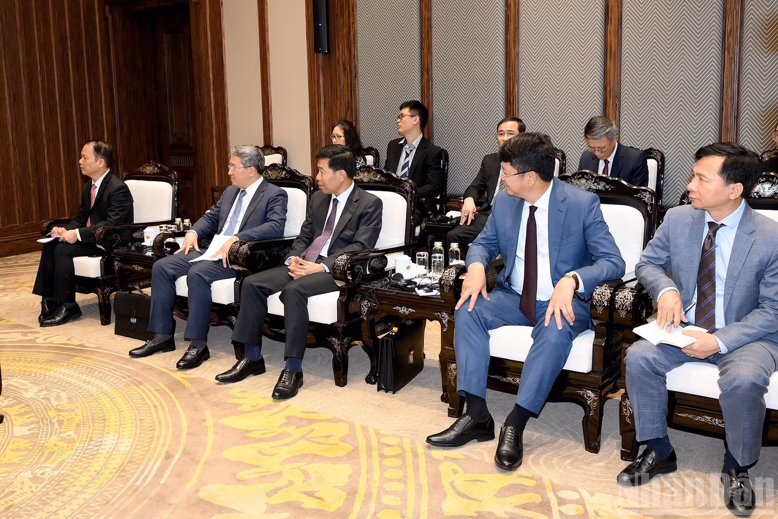 Delegates attend the reception.
