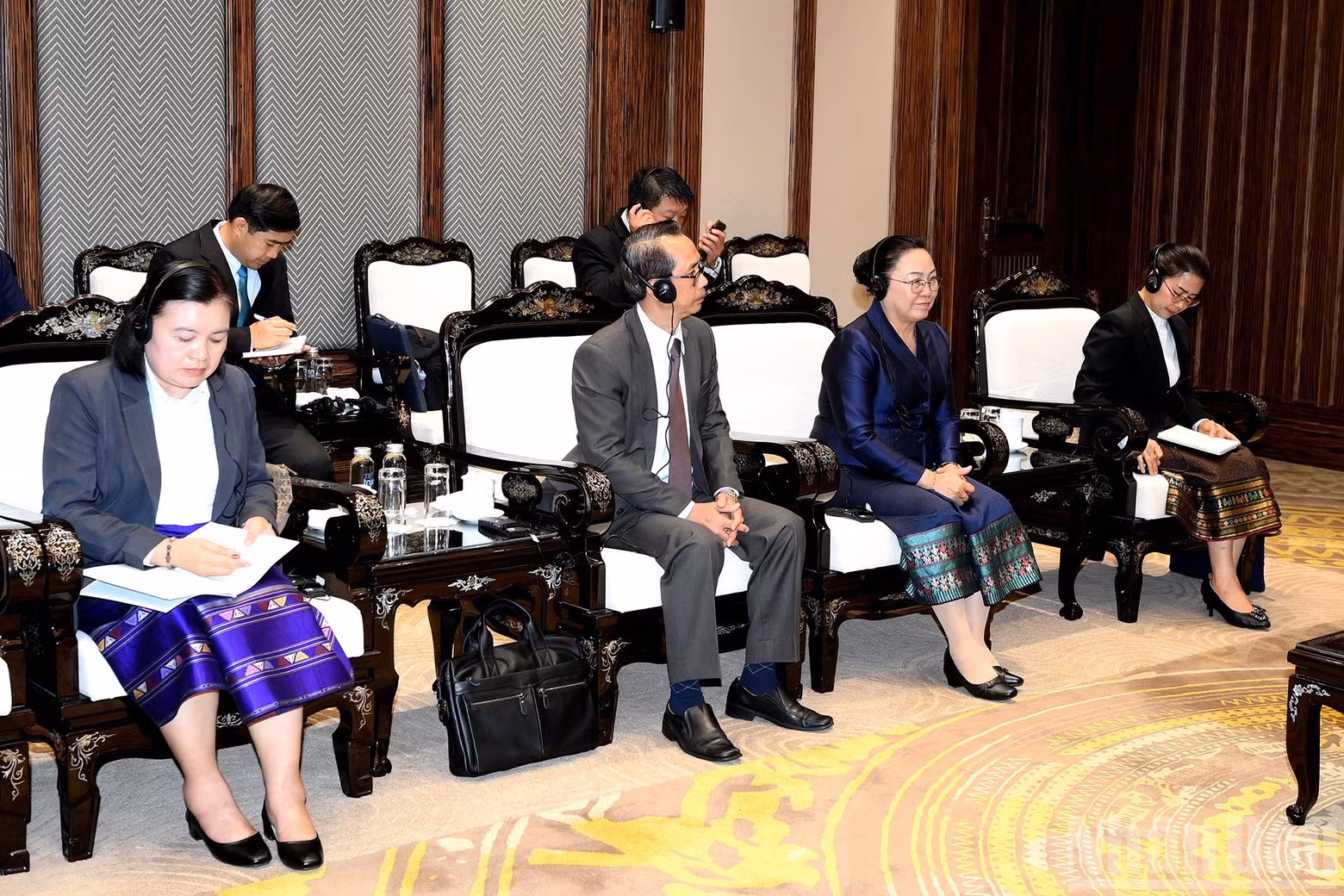 Delegates attend the reception.