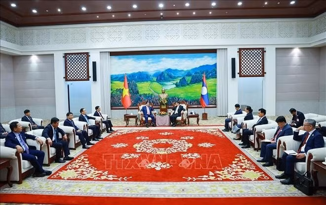 At the meeting between Prime Minister Pham Minh Chinh met with General Secretary of the Lao People’s Revolutionary Party (LPRP) and President of Laos Thongloun Sisoulith on December 3 afternoon. Photo: VNA