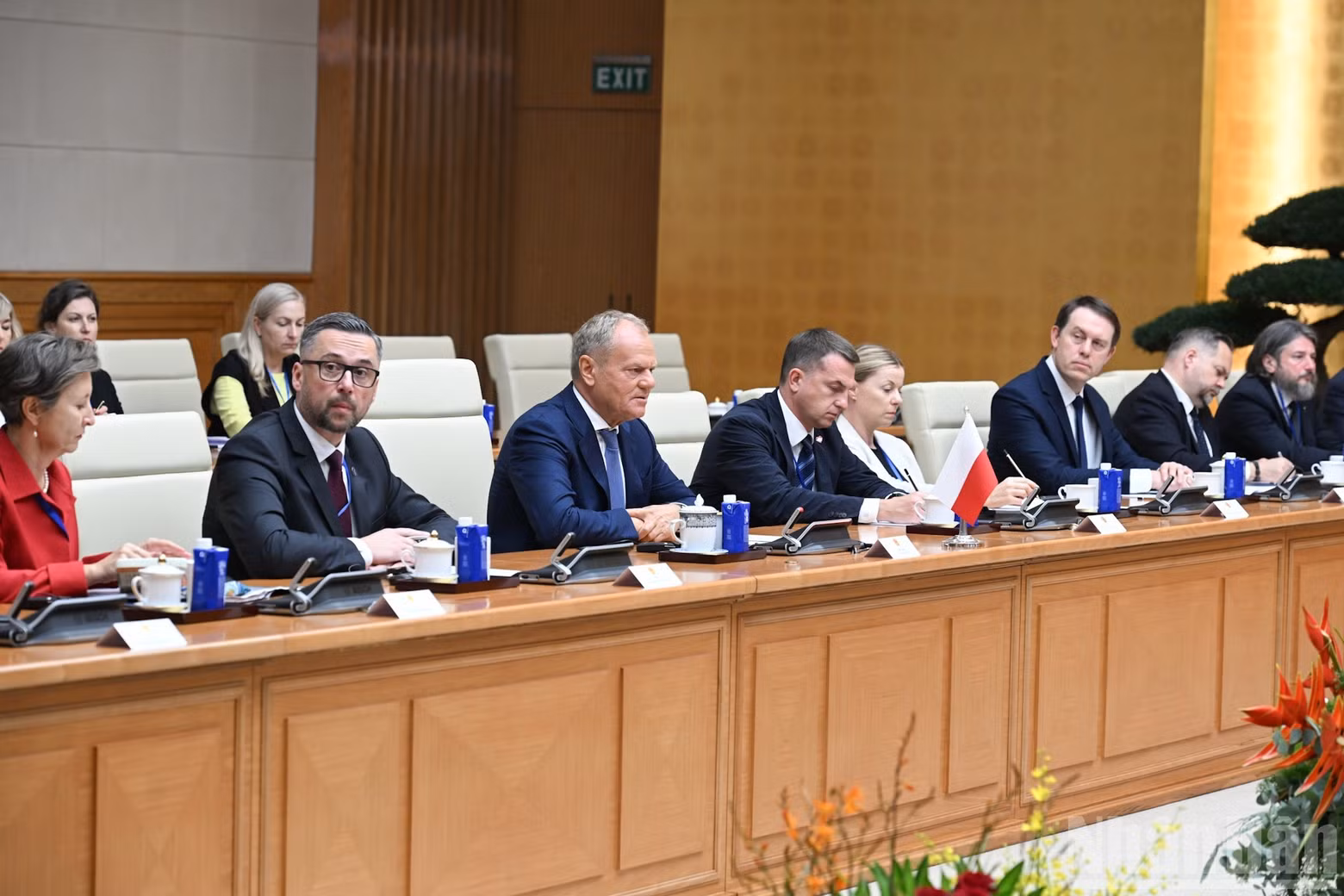 Polish Prime Minister Donald Tusk and other participants in the talks.