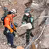 Vietnamese rescue personnel search for victims beneath the rubble. (Photo: VNA)