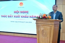 Director General of the Import–Export Department Nguyen Anh Son speaks at the event