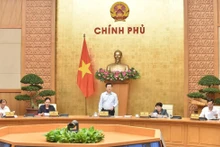 Deputy Prime Minister Mai Van Chinh chairs a meeting of the steering committee for the exhibition on national achievements marking the 80th National Day. (Photo: VGP)