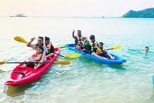 Tourists enjoying a kayaking trip on Thanh Lan Island
