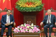 Party General Secretary To Lam (R) receives Gautam Adani, Chairman of the Adani Group of India in Ha Noi on July 30. (Photo: NDO)