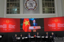 Deputy Prime Minister Tran Hong Ha delivers his remarks to the forum via a recorded message. (Photo: NDO)