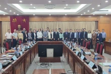 Delegates at the working session on December 11, 2025 (Photo: VNA)