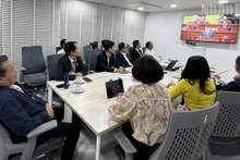 VCBA members follow the closing session of the 14th National Congress of the Communist Party of Viet Nam. (Photo: Dinh Truong)