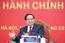 Prime Minister Pham Minh Chinh addresses the working session with the Academy of Public Administration and Governance (APAG) in Ha Noi on February 28. (Photo: NDO)