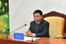 Minister of Finance Nguyen Van Thang speaks at the meeting. (Photo: Ministry of Finance)