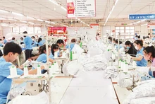 Garment production for export at Hoa Tho Textile and Garment Joint Stock Corporation.