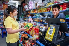 Business households and individual business owners will officially pay tax under the declaration-based method (tax calculated on actual revenue) from January 1, 2026. (Photo: DAT THANH)