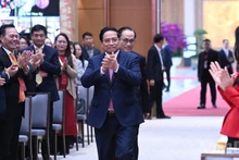 Prime Minister Pham Minh Chinh attends the national conference reviewing the implementation of Resolution No. 36-NQ/TW on OVs affairs and guiding documents of the Party Central Committee's Politburo and Secretariat in this field (Photo: NDO)