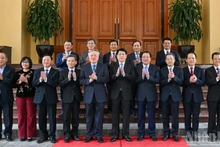 President Luong Cuong and delegates at the meeting