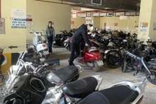The electric vehicle parking area at CT2 Thach Ban apartment building is packed with vehicles.