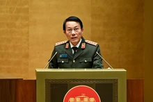 General Luong Tam Quang, Politburo member and Minister of Public Security, speaks at the national conference in Ha Noi on February 7. (Photo: NDO)
