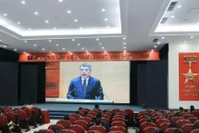 Party members of the Viet Nam News Agency attend the event via videoconferencing on February 7. (Photo: VNA)