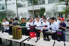 At a display of UAVs (Photo: VNA)