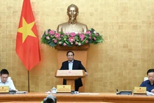 Prime Minister Pham Minh Chinh chairs the Government’s second thematic session on law-making in September. (Photo: NDO/Tran Hai)