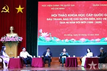 Participants join a panel discussion at the event (Photo: qdnd.vn)