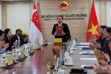 Acting Minister of Agriculture and Environment of Viet Nam Tran Duc Thang stresses that the agreement provides a bilateral legal framework enabling Vietnamese organisations and businesses to register greenhouse gas emission reduction projects.