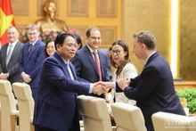 Prime Minister Pham Minh Chinh and UK businesses. (Photo: NDO)