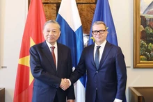 General Secretary of the Communist Party of Viet Nam Central Committee To Lam (L) and Finnish Prime Minister Petteri Orpo at their meeting in Helsinki on October 21 afternoon (local time). (Photo: VNA)