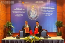 Prosecutor General of the Supreme People’s Procuracy of Viet Nam Nguyen Huy Tien and Moroccan Minister of Justice Abdellatif Ouahbi sign the mutual legal assistance agreement in criminal matters between Viet Nam and the Kingdom of Morocco.