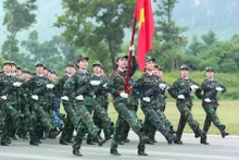Female officers from multiple forces at the rehearsal. (Photo: VNA)