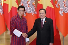 National Assembly Chairman Tran Thanh Man (R) and King of Bhutan Jigme Khesar Namgyel Wangchuck. (Photo: NDO)