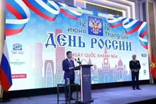 Deputy Prime Minister Le Thanh Long delivers remarks at the reception marking Russia’s National Day, June 12. (Photo: baochinhphu.vn)
