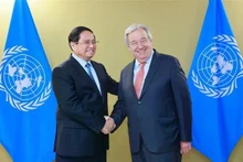 Prime Minister Pham Minh Chinh (L) and United Nations Secretary-General Antonio Guterres in Nice, France, on June 9 during their attendance of the third United Nations Ocean Conference (UNOC3). (Photo: VNA)