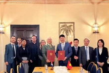 Deputy Minister of Justice Nguyen Thanh Tinh and Cuban Deputy Minister of Justice Pilar Alicia Varona sign the 2026 Activity Plan for the Project on Technical Support for the Ministry of Justice of Cuba (Photo: Vietnamese Embassy in Cuba)