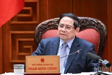 Prime Minister Pham Minh Chinh speaks at the meeting of the Government’s standing members in Ha Noi on March 21. (Photo: VNA)