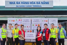 Representatives from the Viet Nam Disaster and Dyke Management Authority receive emergency aid from the ASEAN Coordinating Centre for Humanitarian Assistance on Disaster Management (AHA Centre) on November 11. 
