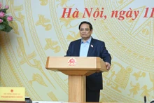 Prime Minister Pham Minh Chinh delivering his speech at the meeting.