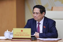 Prime Minister Pham Minh Chinh speaking at the meeting (Photo: VNA)