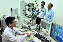 PhD candidates conduct scientific research in a laboratory at Ha Noi University of Science and Technology. (Photo: Nguyen Dang)