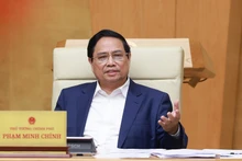 Prime Minister Pham Minh Chinh addresses the Government’s law-making session in Ha Noi on July 23. (Photo: VNA)