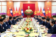At the talks between General Secretary of the Communist Party of Vietnam Central Committee To Lam and General Secretary of the Lao People’s Revolutionary Party Central Committee and President of Laos Thongloun Sisoulith. (Photo: NDO)