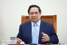 Prime Minister Pham Minh Chinh holds phone talks with the Prime Minister and Minister of Foreign Affairs of the State of Qatar, Sheikh Mohammed bin Abdulrahman bin Jassim Al-Thani. (Photo: VNA)