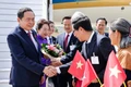 National Assembly Chairman Tran Thanh Man, his spouse Nguyen Thi Thanh Nga, and a high-ranking Vietnamese delegation are welcomed at Geneva international airport, Switzerland on July 27 afternoon (local time). (Photo: VNA)