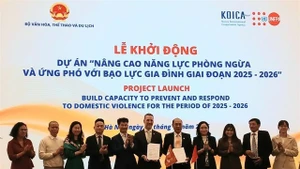 Representatives of the Ministry of Culture, Sports and Tourism and UNFPA at the signing ceremony of the cooperation agreement. (Photo: VNA)