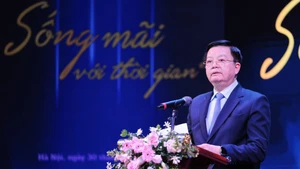 Deputy Prime Minister Mai Van Chinh speaks at the event (Photo: nld.com.vn)