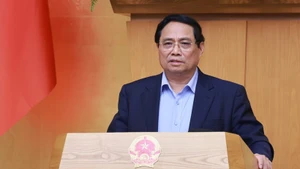 Prime Minister Pham Minh Chinh speaks at the Government’s regular meeting on November 8. (Photo: VNA)